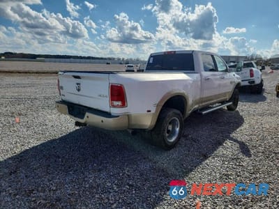 Czwarte zdjęcie samochodu z boku: 2015 RAM 3500 LONGHORN VIN:3C63RRKL8FG621139 - miniatura