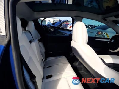 Zdjęcie 10 z 12 samochodu: 2023 TESLA MODEL Y VIN:7SAYGDEF3PF852795 - miniatura
