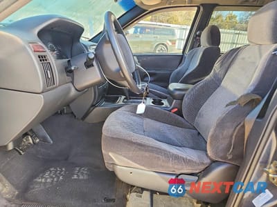 Zdjęcie 7 z 13 samochodu: 2000 JEEP GRAND CHEROKEE LAREDO VIN:1J4G248S8YC410703 - miniatura