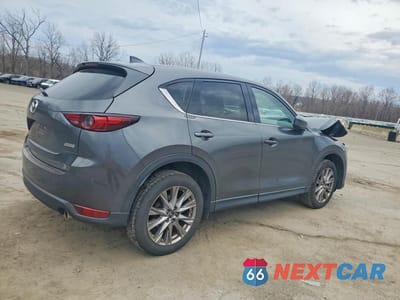 Trzecie zdjęcie samochodu z tyłu: 2019 MAZDA CX-5 GRAND TOURING VIN:JM3KFBDMXK0533063 - miniatura