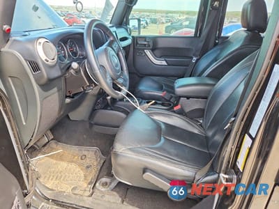 Zdjęcie 7 z 11 samochodu: 2016 JEEP WRANGLER UNLIMITED SAHARA VIN:1C4BJWEG8GL163812 - miniatura