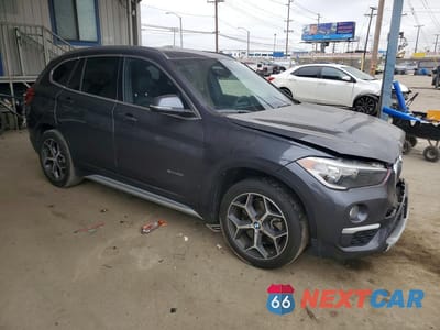 Czwarte zdjęcie samochodu z boku: 2018 BMW X1 XDRIVE28I VIN:WBXHT3Z39J4A66331 - miniatura