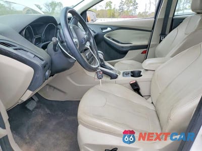 Zdjęcie 7 z 12 samochodu: 2012 FORD FOCUS SEL VIN:1FAHP3H2XCL407841 - miniatura