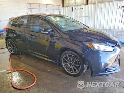 Czwarte zdjęcie samochodu z boku: 2014 FORD FOCUS ST VIN:1FADP3L9XEL181211 - miniatura