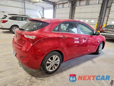 Trzecie zdjęcie samochodu z tyłu: 2014 HYUNDAI ELANTRA GT BASE VIN:KMHD35LH8EU210090 - miniatura