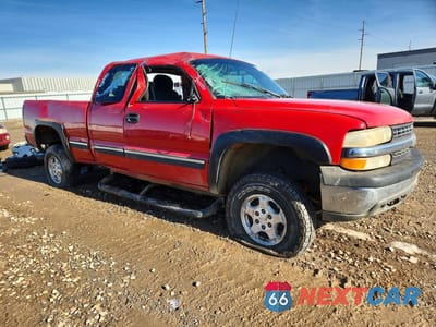 Czwarte zdjęcie samochodu z boku: 1999 CHEVROLET SILVERADO K1500 VIN:1GCEK19T1XE201230 - miniatura