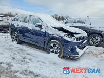 Czwarte zdjęcie samochodu z boku: 2022 TOYOTA RAV4 PRIME XSE VIN:JTMFB3FV8ND086151 - miniatura