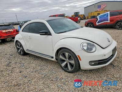 Czwarte zdjęcie samochodu z boku: 2012 VOLKSWAGEN BEETLE VIN:3VWV67AT8CM663806 - miniatura