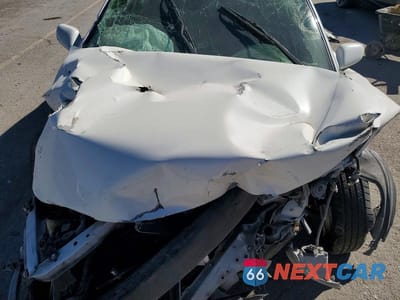 Zdjęcie 12 z 13 samochodu: 2002 TOYOTA CAMRY SOLA VIN:2T1CF22P82C576106 - miniatura