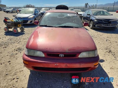 Piąte zdjęcie samochodu w środku: 1997 TOYOTA COROLLA DX VIN:1NXBB02E5VZ608619 - miniatura