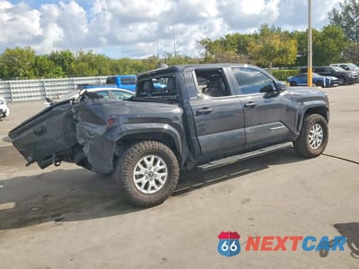 Trzecie zdjęcie samochodu z tyłu: 2024 TOYOTA TACOMA SR5 VIN:3TMKB5FNXRM017899 - miniatura