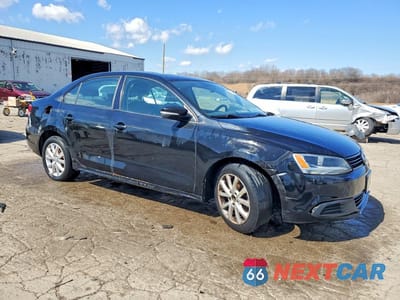 Czwarte zdjęcie samochodu z boku: 2011 VOLKSWAGEN JETTA SE VIN:3VWDX7AJ4BM007110 - miniatura