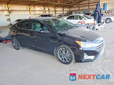 Czwarte zdjęcie samochodu z boku: 2019 HYUNDAI ELANTRA LIMITED VIN:5NPD84LF3KH409603 - miniatura