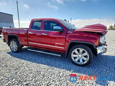 Czwarte zdjęcie samochodu z boku: 2018 GMC SIERRA K1500 SLT VIN:1GTV2NEJ0JZ197179 - miniatura