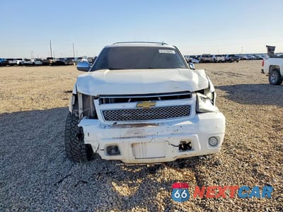 Piąte zdjęcie samochodu w środku: 2012 CHEVROLET SUBURBAN C1500 LT VIN:1GNSCJE09CR291250 - miniatura