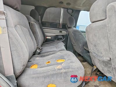 Zdjęcie 11 z 13 samochodu: 2002 CHEVROLET TAHOE C1500 VIN:1GNEC13V22R181571 - miniatura