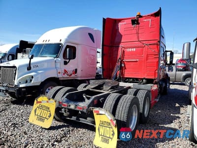 Czwarte zdjęcie samochodu z boku: 2019 VOLVO VNL SEMI TRUCK VIN:4V4NC9EH2KN904085 - miniatura