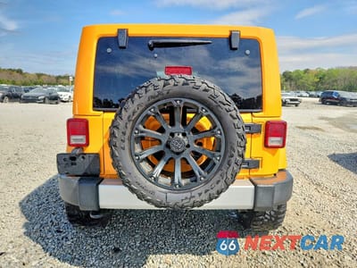 Zdjęcie 6 z 12 samochodu: 2012 JEEP WRANGLER UNLIMITED SAHARA VIN:1C4BJWEGXCL133897 - miniatura
