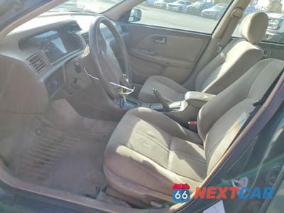 Zdjęcie 7 z 11 samochodu: 2000 TOYOTA CAMRY LE VIN:JT2BG22K2Y0519182 - miniatura