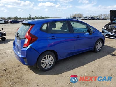 Trzecie zdjęcie samochodu z tyłu: 2016 HONDA FIT LX VIN:JHMGK5H50GX020125 - miniatura