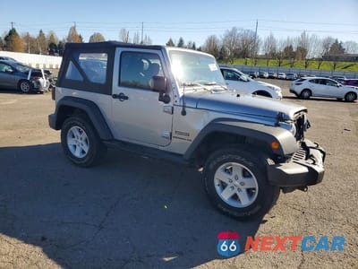 Czwarte zdjęcie samochodu z boku: 2017 JEEP WRANGLER SPORT VIN:1C4GJWAG5HL660877 - miniatura