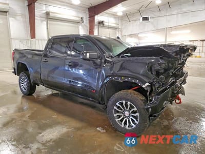 Czwarte zdjęcie samochodu z boku: 2023 GMC SIERRA K1500 AT4 VIN:1GTUUEE80PZ161875 - miniatura