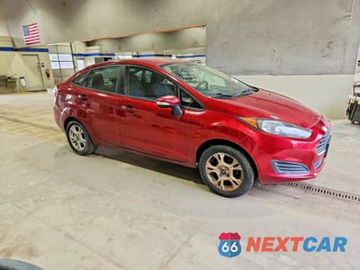 Czwarte zdjęcie samochodu z boku: 2014 FORD FIESTA SE VIN:3FADP4BJ3EM189618 - miniatura