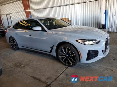 Czwarte zdjęcie samochodu z boku: 2024 BMW I4 EDRIVE 35 VIN:WBY43AW05RFR98855 - miniatura