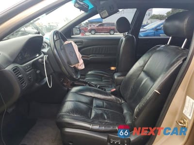 Zdjęcie 7 z 12 samochodu: 1997 NISSAN MAXIMA GXE VIN:JN1CA21D2VT845044 - miniatura