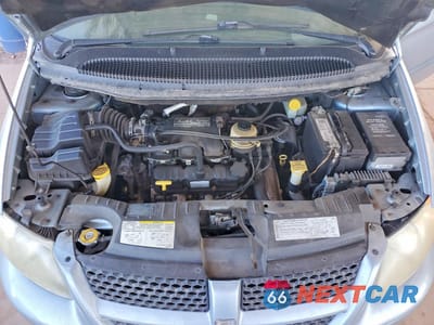 Zdjęcie 12 z 14 samochodu: 2003 DODGE GRAND CARAVAN SPORT VIN:2D4GP44303R259347 - miniatura