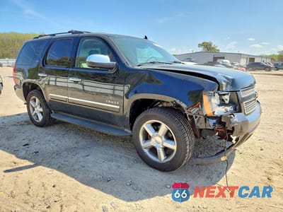 Czwarte zdjęcie samochodu z boku: 2011 CHEVROLET TAHOE K1500 LTZ VIN:1GNSKCE02BR388707 - miniatura