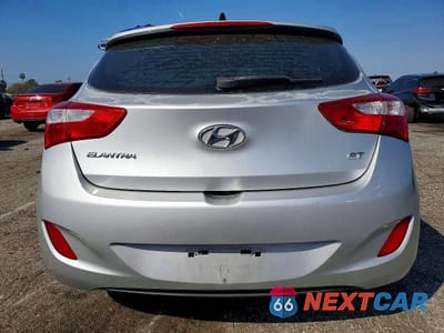 Zdjęcie 6 z 11 samochodu: 2013 HYUNDAI ELANTRA GT BASE VIN:KMHD35LEXDU037046 - miniatura