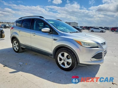 Czwarte zdjęcie samochodu z boku: 2014 FORD ESCAPE VIN:1FMCU0G98EUB79485 - miniatura