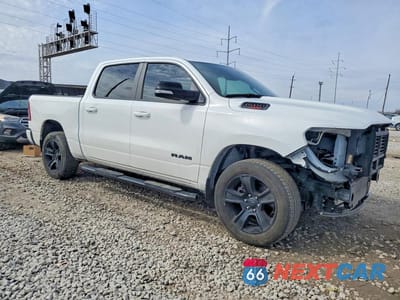 Czwarte zdjęcie samochodu z boku: 2022 RAM 1500 BIG HORN VIN:1C6SRFFM1NN317458 - miniatura