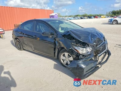 Czwarte zdjęcie samochodu z boku: 2017 CHEVROLET CRUZE LS VIN:1G1BC5SMXH7225549 - miniatura