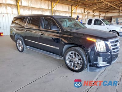 Czwarte zdjęcie samochodu z boku: 2015 CADILLAC ESCALADE ESV VIN:1GYS3GKJ9FR244131 - miniatura