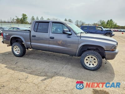 Czwarte zdjęcie samochodu z boku: 2004 DODGE DAKOTA QUAD SLT VIN:1D7HG48N84S758058 - miniatura