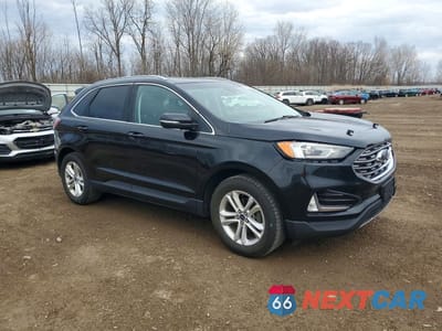Czwarte zdjęcie samochodu z boku: 2020 FORD EDGE SEL VIN:2FMPK3J96LBA76778 - miniatura
