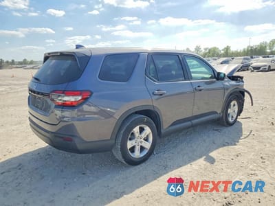 Trzecie zdjęcie samochodu z tyłu: 2023 HONDA PILOT LX VIN:5FNYG2H22PB010699 - miniatura