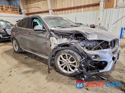 Czwarte zdjęcie samochodu z boku: 2016 BMW X6 VIN:5UXKU2C52G0N78674 - miniatura