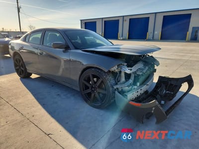 Czwarte zdjęcie samochodu z boku: 2018 DODGE CHARGER POLICE VIN:2C3CDXKT2JH214877 - miniatura