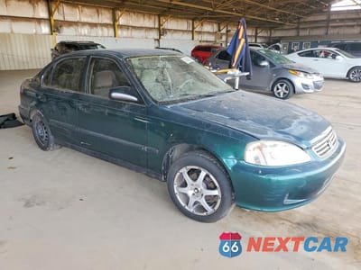 Czwarte zdjęcie samochodu z boku: 2000 HONDA CIVIC LX VIN:1HGEJ6677YL047435 - miniatura