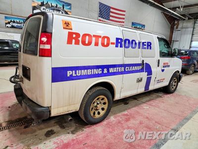 Trzecie zdjęcie samochodu z tyłu: 2014 CHEVROLET EXPRESS G1500 VIN:1GCSGAFX4E1145316 - miniatura