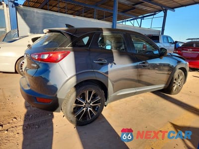 Trzecie zdjęcie samochodu z tyłu: 2016 MAZDA CX-3 GRAND TOURING VIN:JM1DKBD76G0111645 - miniatura