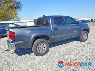 Trzecie zdjęcie samochodu z tyłu: 2018 TOYOTA TACOMA SR5 V6 VIN:3TMAZ5CNXJM075754 - miniatura