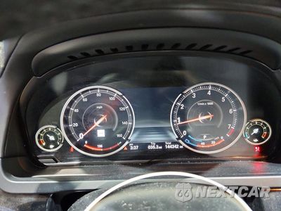 Zdjęcie 9 z 13 samochodu: 2015 BMW 750 LXI VIN:WBAYF8C50FD654860 - miniatura