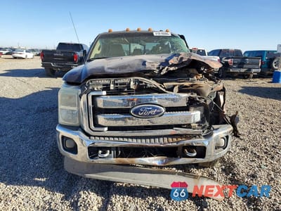Piąte zdjęcie samochodu w środku: 2011 FORD F350 SUPER DUTY VIN:1FT8W3DT3BEC87928 - miniatura