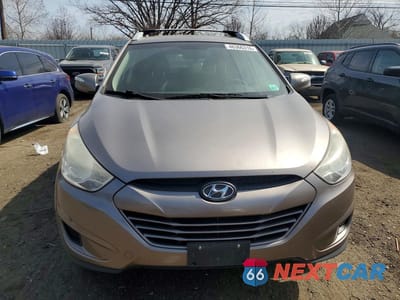 Piąte zdjęcie samochodu w środku: 2012 HYUNDAI TUCSON GLS VIN:KM8JUCAC2CU372516 - miniatura