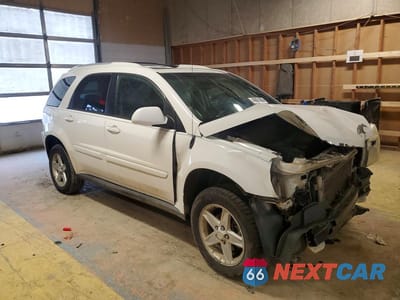 Czwarte zdjęcie samochodu z boku: 2006 CHEVROLET EQUINOX LT VIN:2CNDL63F666012631 - miniatura