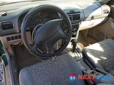 Zdjęcie 8 z 13 samochodu: 1998 SUBARU IMPREZA OUTBACK VIN:JF1GF4854WH814690 - miniatura